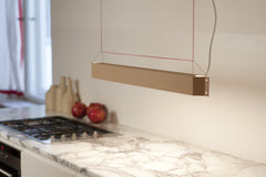 Numerouno pendant lamp over kitchen counter